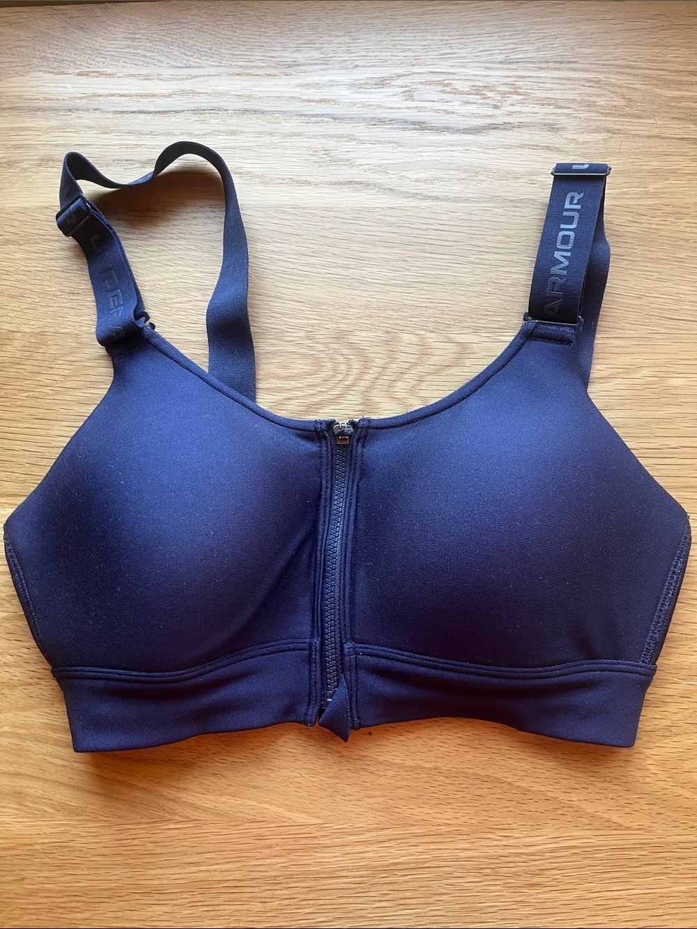 Never worn NWOT Under Armour Front-Zip High Support Sports Bra - Navy Blue